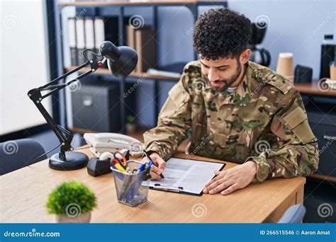 Soldier signing a contract